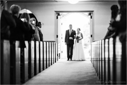 wedding aisle moment black and white