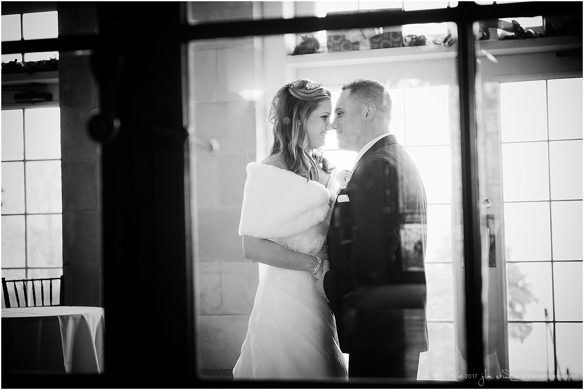 aldrich mansion bride and groom through the window black and white