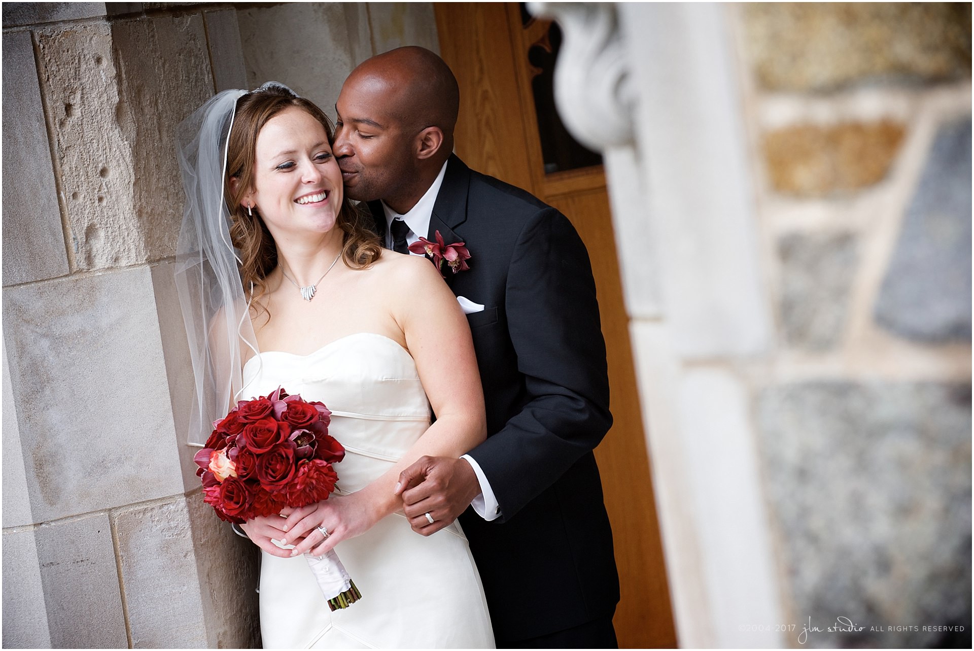boston college wedding photos red bouquet