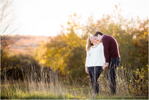 fall sunset engagement photo cream and burgundy sweaters