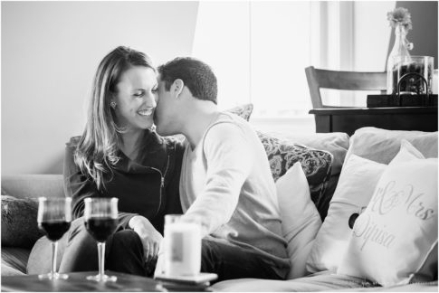 home engagement session kissing laughing