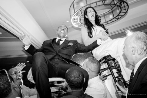 bride and groom during the horah wedding moment