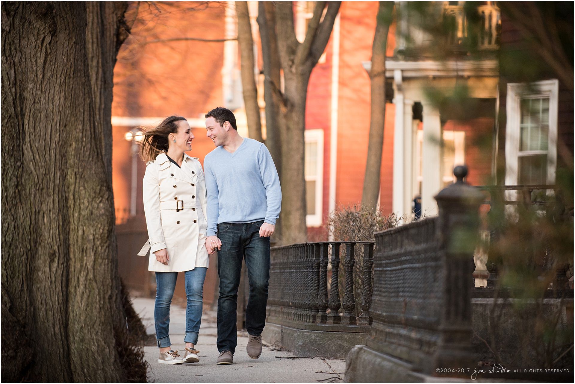 engagement photos walking in the south end sunset