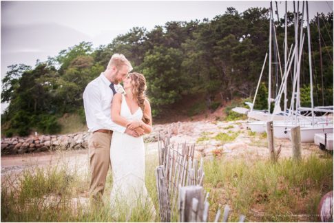 chequessett yacht club bride and groom in tall beach grass